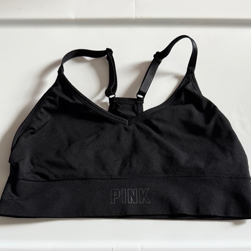Victoria’s Secret Pink! Black M racer back sports bra. New. Washed/never worn.